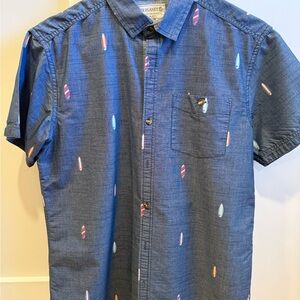 Free Planet Blue Shirt with Colorful Accents